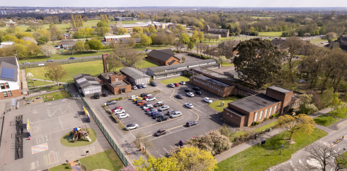 This image: An aerial view of the site taken from the west with Charnor Road in the foreground.
						 The map: The map has zoomed into the site, showing aerial imagery and interactive map markers 
						 along Charnor Road and Knowles Road. These markers bring up streetview photos of the site when 
						 clicked on.